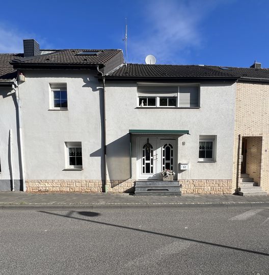 Charmantes Reihenmittelhaus mit viel Potential und großzügigem Garten